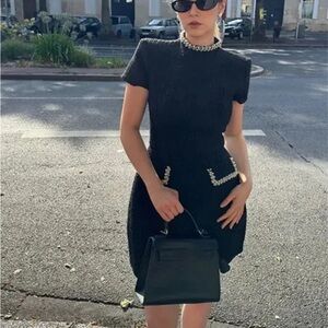 Elegant Black Dress with Pearl Accents